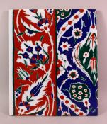 A TURISH IZNIK STYLE POTTERY TILE SECTION, with floral decoration, 33cm x 27cm