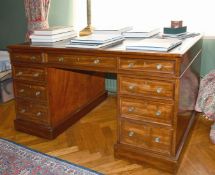 A GOOD GEORGE III MAHOGANY DESK with inset leather top, three frieze drawers, three drawers to