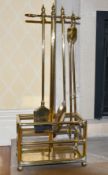 A SET OF BRASS FIRE IRONS.