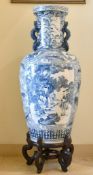 A LARGE CHINESE KANG HIS STYLE BLUE AND WHITE VASE AND COVER, on a wooden stand. 3ft 7ins high.