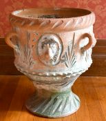 A CIRCULAR TERRACOTTA POT. 1ft 1ins diameter.