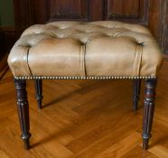 A GREEN LEATHER PADDED TOP STOOL on fluted mahogany legs. 1ft 10ins long x 1ft 4ins wide x 1ft