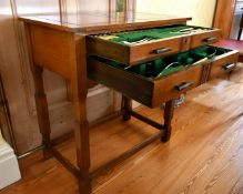 AN OAK CANTEEN OF CUTLERY in two drawers, for six people.
