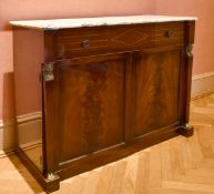 A MAHOGANY MARBLE TOP CUPBOARD, after Thomas Hope, with one long drawer over double panel doors with