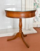 A MODERN DRUM TABLE. 1ft 8ins diameter.