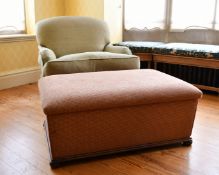 A DEEP EASY ARMCHAIR and POUFFE (3).