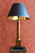 A TABLE LAMP AND SHADE.