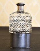 A SILVER AND CUT GLASS WHISKY FLASK.London 1913.