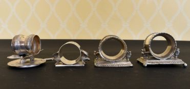 FOUR NOVELTY PLATE BIRDS AND BUTTERFLIES SEVIETTE RINGS.