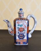 A JAPAN PATTERNED TEAPOT AND COVER. 7.5ins high.