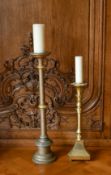 A GILT AND A SILVERED CANDLESTAND (2). 1ft 10ins and 2ft 6ins high.