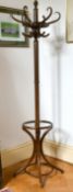 A BENTWOOD STICK STAND.