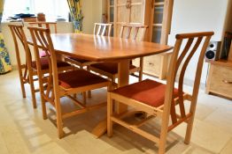 A MODERN DINING TABLE AND SIX CHAIRS, made of brown oak and sycamore, by Ron Jones Designer and