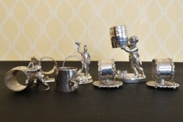 FOUR NOVELTY PLATE FIGURAL SERVIETTE RINGS and THREE OTHERS (7).