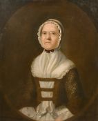 An 18th century half-length portrait of a lady in a lace headdress, possibly American, oil on