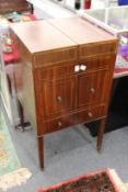 A 19th century mahogany washstand with bi-fold top