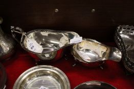 Two silver sauce boats