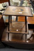 A 19th century Italian Sorrento inlaid two tier occasional table