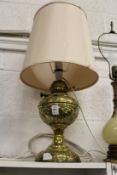A brass oil lamp converted to electricity