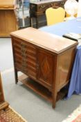 A mahogany music cabinet