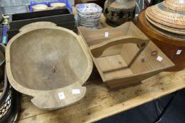 A large carved wood bowl and a pine trug style basket