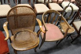 A cane seated elbow chair, an inlaid horseshoe shaped occasional chair and a Victorian ebonised cane