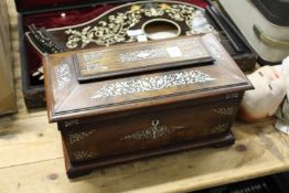 A good 19th century mother of pearl inlaid rosewood tea caddy
