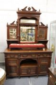A Victorian large walnut mirror backed sideboard