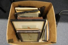 A box of paintings and prints