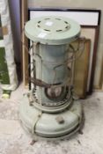 An old paraffin floor standing heater