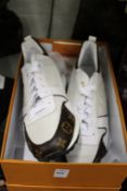 A boxed pair of ladies shoes size 43, unused