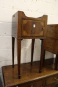 A mahogany pot cupboard with inlaid door