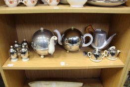 Metal clad porcelain tea pots and similar items