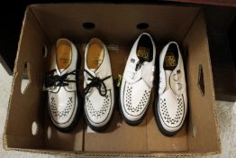 Two pairs of underground shoes