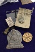 A Tibetan bronze pendant on stand and various other items