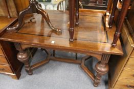 A Continental ebony inlaid oak rectangular centre table on bulbous turned supports