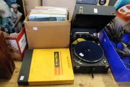 A portable gramaphone and various records
