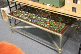 A good decorative large two tier coffee table with inlaid marble top depicting fruit flowers and
