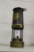 A miners lamp by Thomas and Williams Aberdare