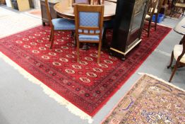 A large red ground Bakhara carpet