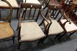 A pair of George III design mahogany elbow chairs