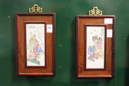 A pair of small Chinese painted porcelain plaques, framed