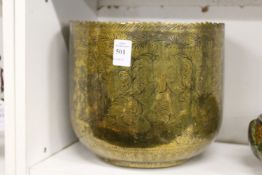 An engraved Eastern brass bowl