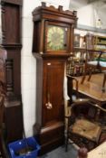 A 19th century oak longcase clock with thirty hour movement the square brass dial signed Benjamin