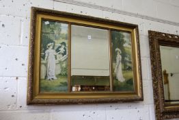 A gilt framed mirror the central mirror plate flanked by a pair of plinths