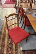 A set of four Victorian inlaid rosewood dining/occasional chairs