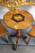 A 19th century inlaid walnut tilt top tripod occasional table