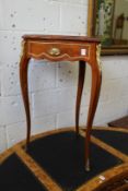 A French style heart shaped vitrine table