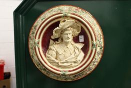 An Eichwald painted terracotta circular plaque depicting a cavalier