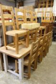 A good set of modern ladderback and rush seated dining chairs